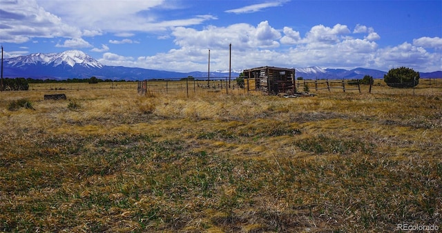 mountain view featuring a rural view