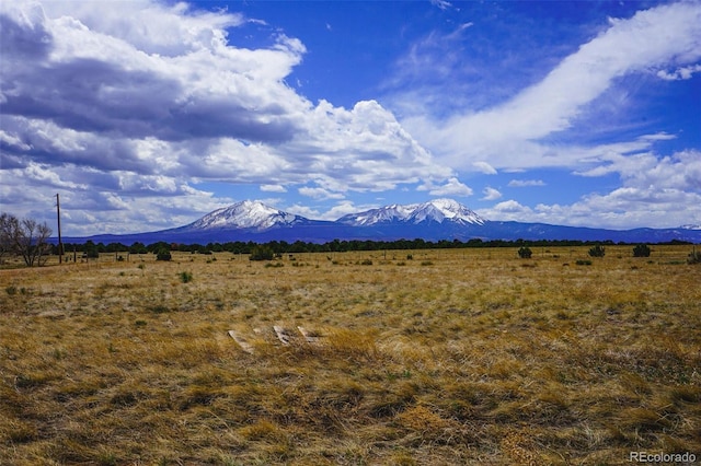 property view of mountains featuring a rural view
