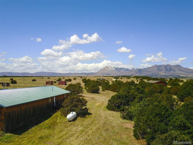 property view of mountains featuring a rural view