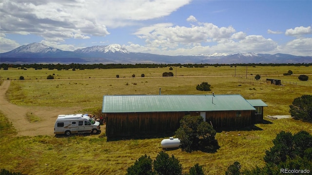 property view of mountains featuring a rural view