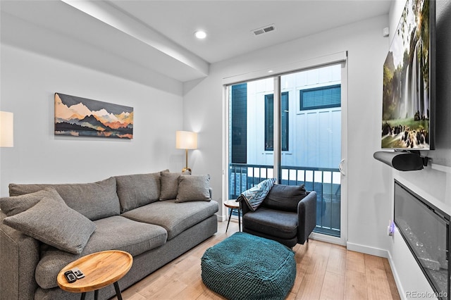 1930 Hooker St Unit 3, Denver, CO 80204 - living area with light wood-type flooring and recessed lighting