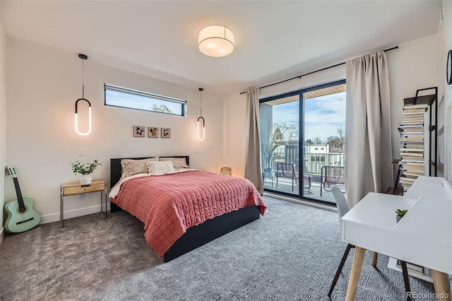 carpeted bedroom with access to outside