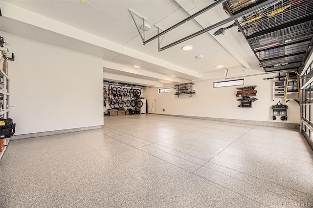 garage featuring baseboards