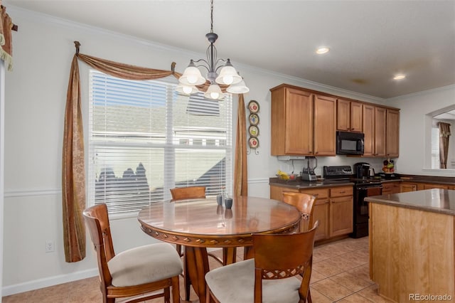 kitchen with crown molding, pendant lighting, black appliances, and a notable chandelier