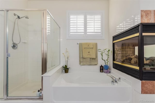 bathroom with independent shower and bath