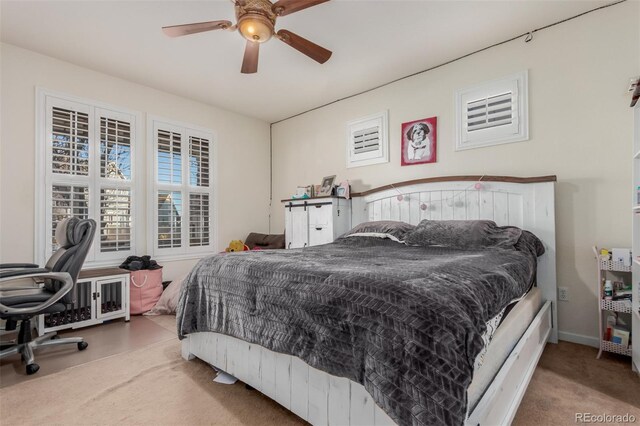 bedroom featuring ceiling fan and carpet floors