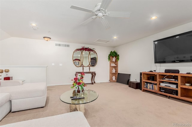 living room with carpet floors and ceiling fan