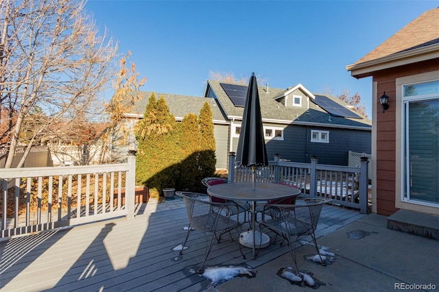 12955 Vallejo Cir, Westminster, CO 80234 - wooden terrace with outdoor dining space