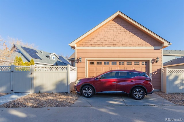 12955 Vallejo Cir, Westminster, CO 80234 - garage with a gate and concrete driveway