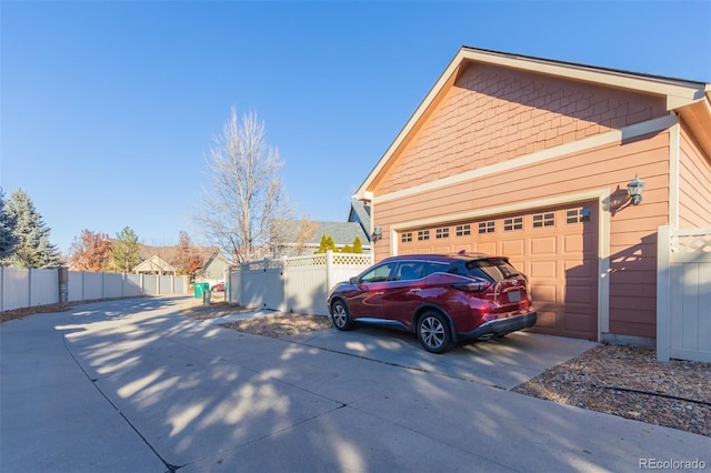 view of property exterior featuring a garage