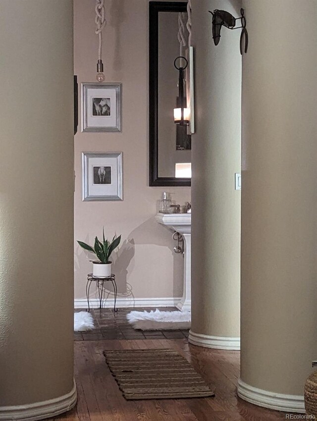 bathroom featuring hardwood / wood-style flooring and sink