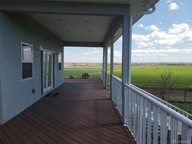 deck featuring a lawn