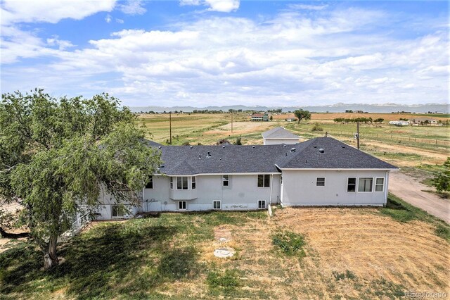 exterior space with a rural view