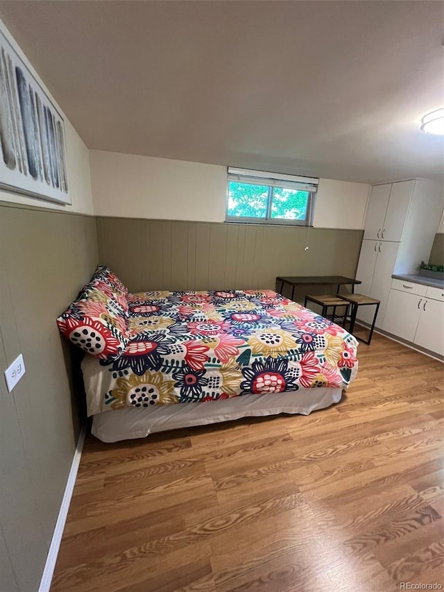 3540 Vrain St, Denver, CO 80212 - bedroom with light wood-type flooring and wooden walls