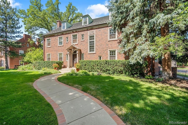 view of front of house with a front lawn