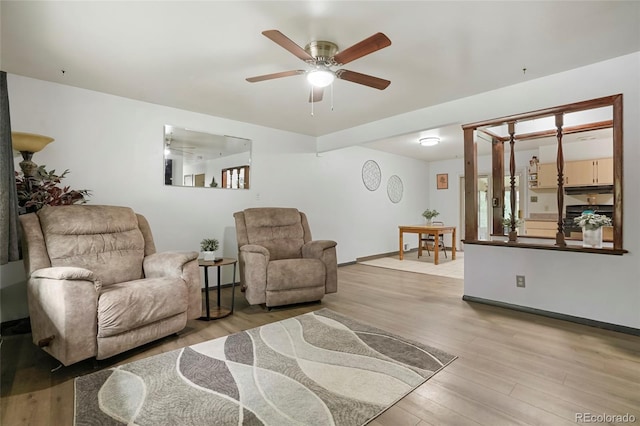 6371 Brooks Dr, Arvada, CO 80004 - living room featuring light wood-type flooring and ceiling fan