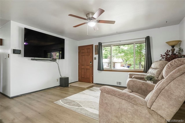 6371 Brooks Dr, Arvada, CO 80004 - living room featuring wood finished floors and a ceiling fan