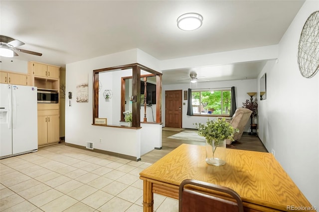 6371 Brooks Dr, Arvada, CO 80004 - living area with a ceiling fan and light tile patterned flooring