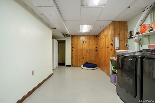 6371 Brooks Dr, Arvada, CO 80004 - finished below grade area with washer and clothes dryer, wood walls, and a drop ceiling