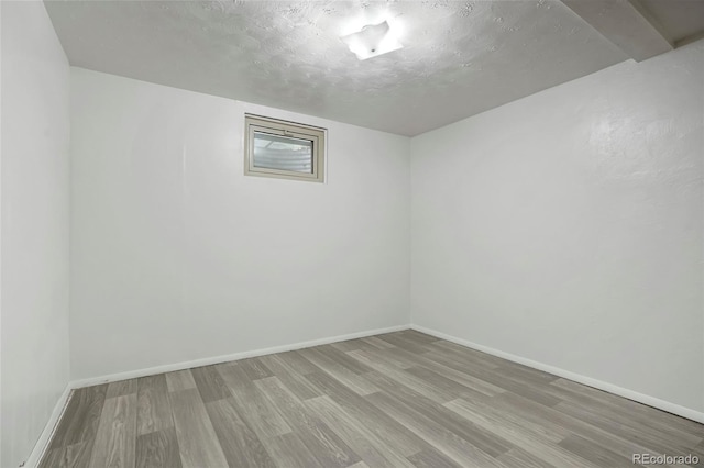 6371 Brooks Dr, Arvada, CO 80004 - spare room with wood finished floors