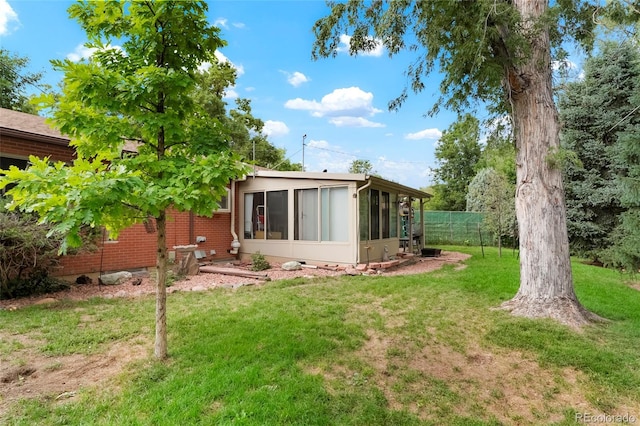 6371 Brooks Dr, Arvada, CO 80004 - back of property with a sunroom