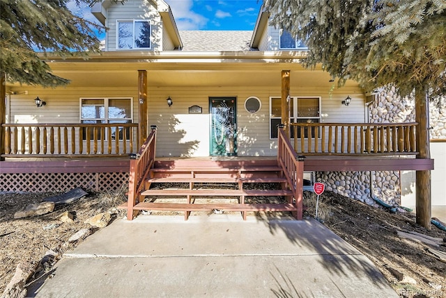 view of front of home featuring covered porch