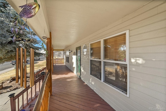 deck with covered porch