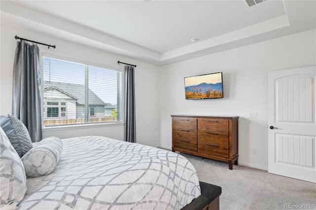15987 E 115th Pl, Commerce City, CO 80022 - carpeted bedroom featuring a tray ceiling and baseboards