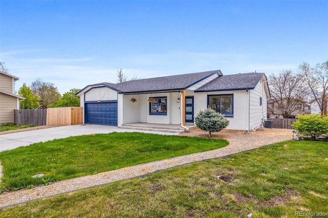 single story home featuring driveway, fence, an attached garage, roof with shingles, and a front lawn