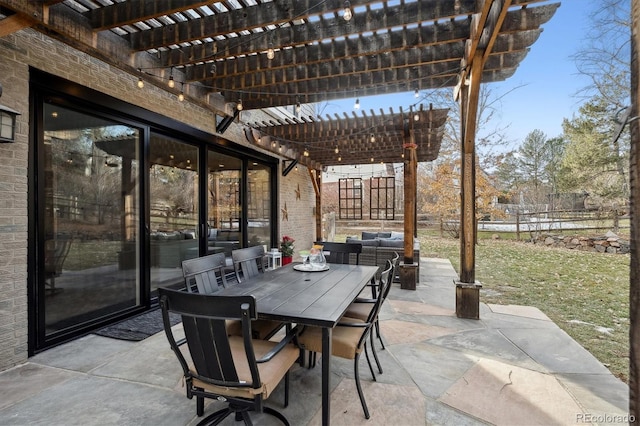 view of patio featuring outdoor dining space, outdoor lounge area, and a pergola