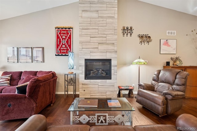 5795 Xenon Way, Arvada, CO 80002 - living room with wood finished floors, high vaulted ceiling, and a fireplace