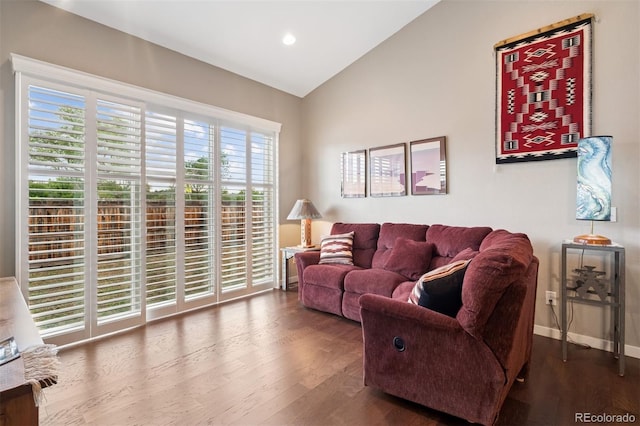 5795 Xenon Way, Arvada, CO 80002 - living area featuring lofted ceiling, wood finished floors, and recessed lighting
