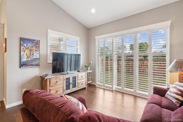 5795 Xenon Way, Arvada, CO 80002 - living room with vaulted ceiling, plenty of natural light, dark wood-type flooring, and recessed lighting