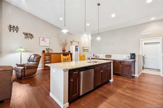 5795 Xenon Way, Arvada, CO 80002 - kitchen with dishwasher, open floor plan, dark wood-style flooring, light stone counters, and recessed lighting