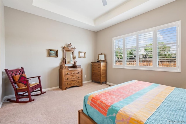 5795 Xenon Way, Arvada, CO 80002 - carpeted bedroom with a raised ceiling and a ceiling fan