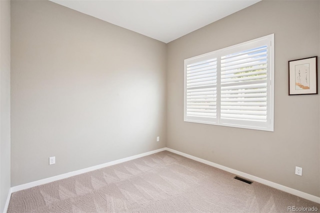 5795 Xenon Way, Arvada, CO 80002 - carpeted spare room featuring baseboards