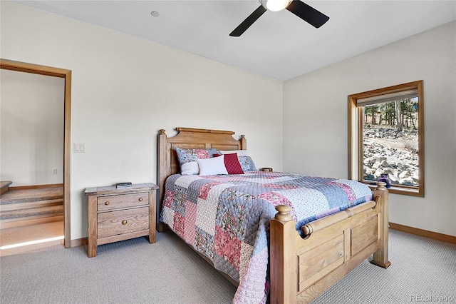 96 Garnet Ln, Pine, CO 80470 - carpeted bedroom featuring baseboards and ceiling fan