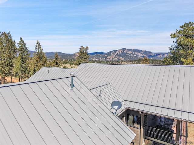 96 Garnet Ln, Pine, CO 80470 - exterior view of a mountain backdrop and a satellite dish