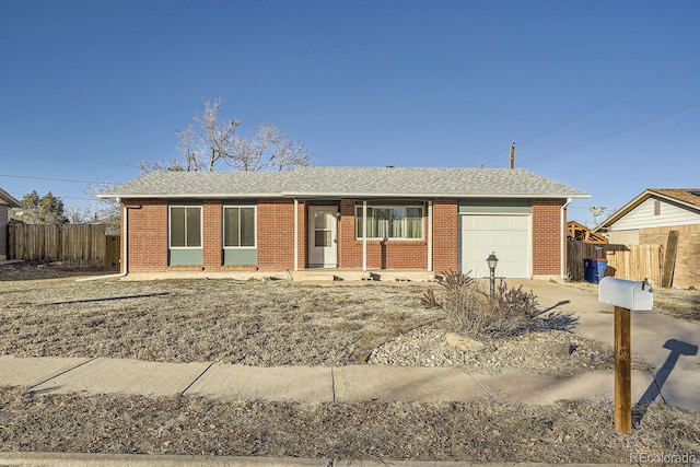 single story home featuring a garage