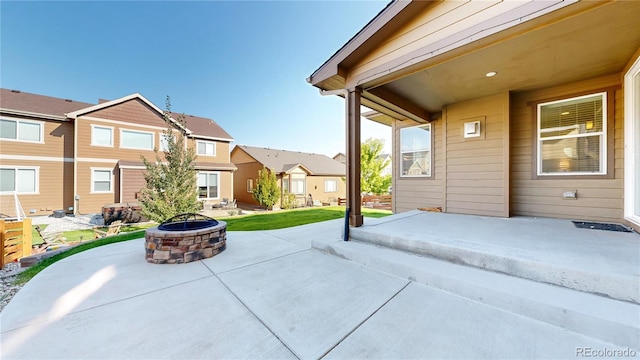 view of patio / terrace with a fire pit