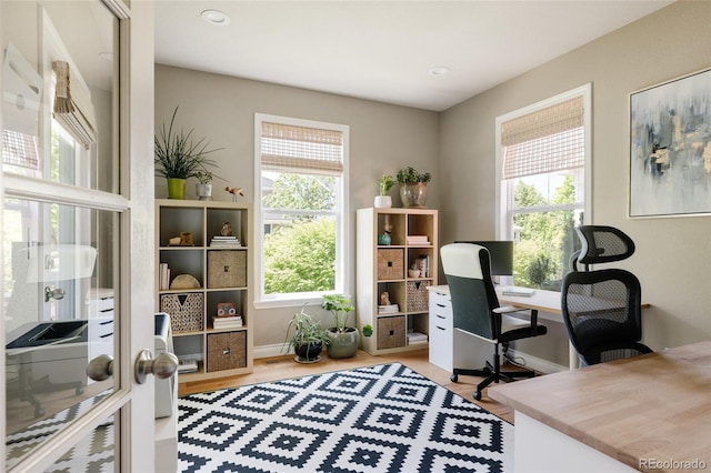 10069 E 28th Ave, Denver, CO 80238 - office space featuring wood finished floors, french doors, and recessed lighting