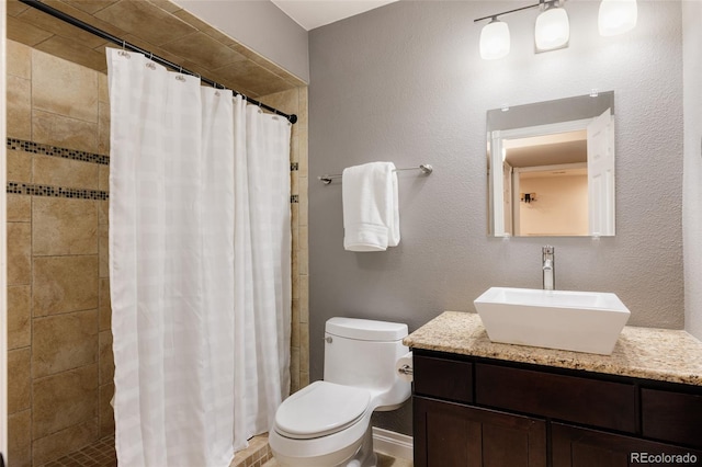10069 E 28th Ave, Denver, CO 80238 - full bathroom featuring vanity and tiled shower