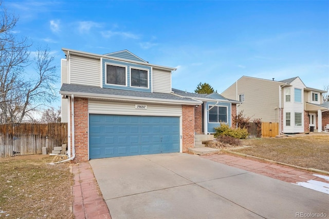 view of front facade featuring an attached garage, brick siding, fence, concrete driveway, and a front lawn