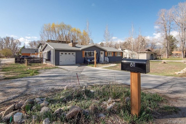 811 W Main St, Buena Vista, CO 81211 - exterior space with a chimney and gravel driveway