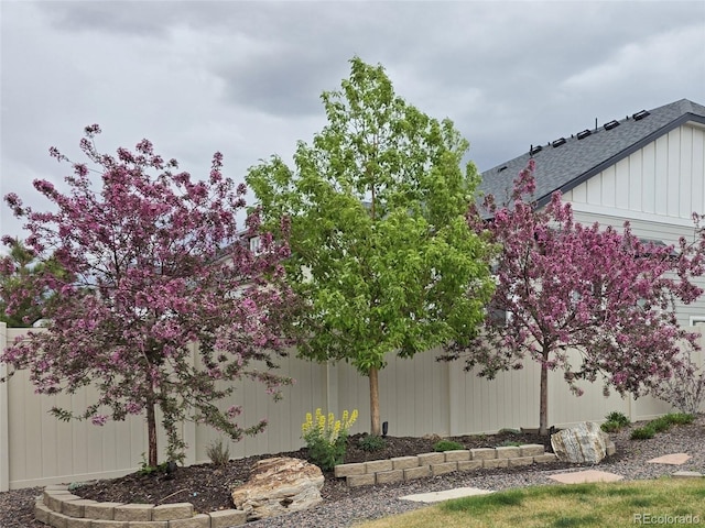21701 E 50th Dr, Aurora, CO 80019 - view of side of property featuring a shingled roof
