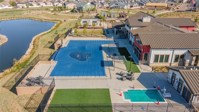 21701 E 50th Dr, Aurora, CO 80019 - view of swimming pool featuring a residential view and a water view