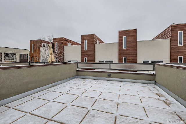 view of patio featuring a balcony