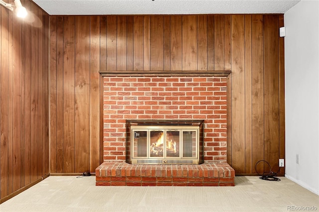 11936 E Oregon Cir, Aurora, CO 80012 - detailed view of a brick fireplace, wooden walls, carpet, and baseboards