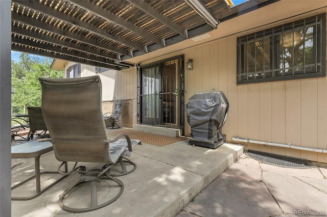 11936 E Oregon Cir, Aurora, CO 80012 - view of patio / terrace with a grill and a pergola