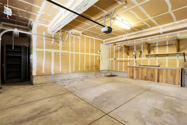 11936 E Oregon Cir, Aurora, CO 80012 - garage featuring a garage door opener